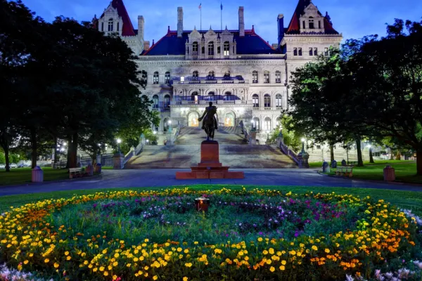 New York State Capitol building at dusk in the spring