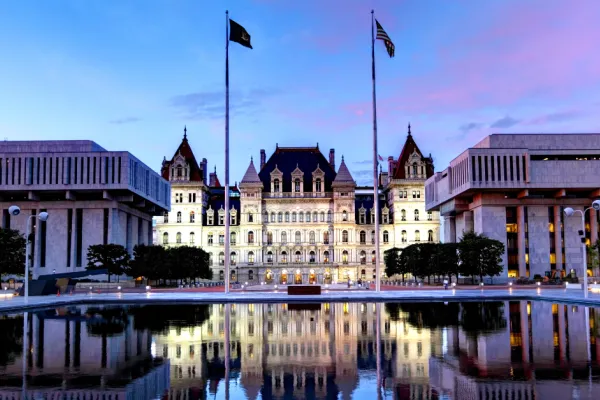 NYS Capitol Building with blue and purple sunset