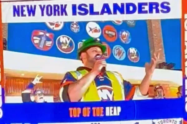 Kyle Viverito on jumbotron singing at UBS Arena 