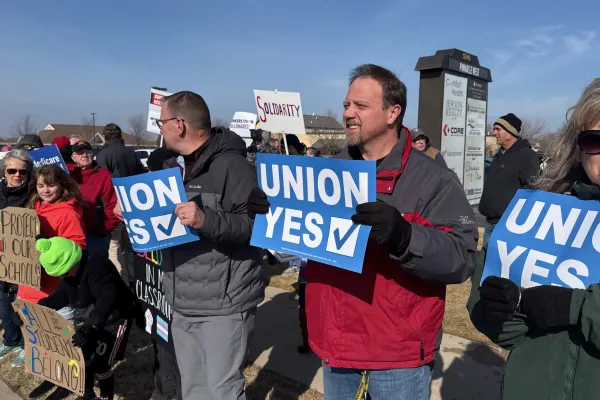 people holding "union yes" signs