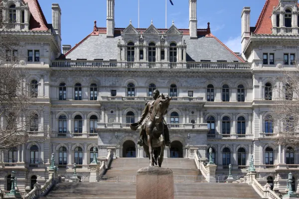 New York State Capitol building on a winter day with blue sky