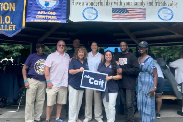 candidate and union members posing for photo