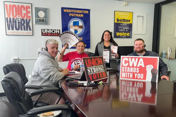 volunteers posing for photo at a phone bank