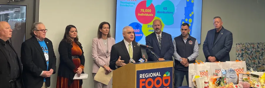Mario Cilento speaking at press conference at Regional Food Bank