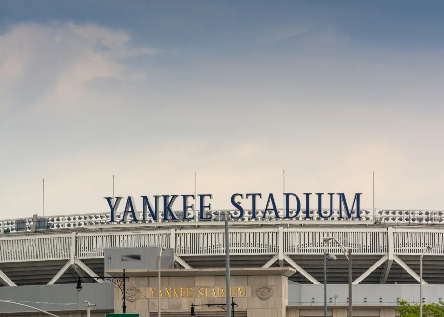 Yankee Stadium sign at sunset