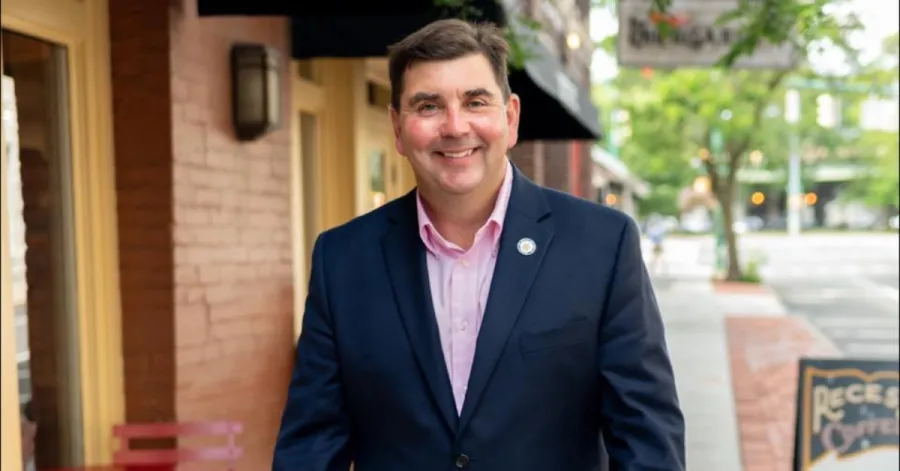 photo of John Mannion on sidewalk