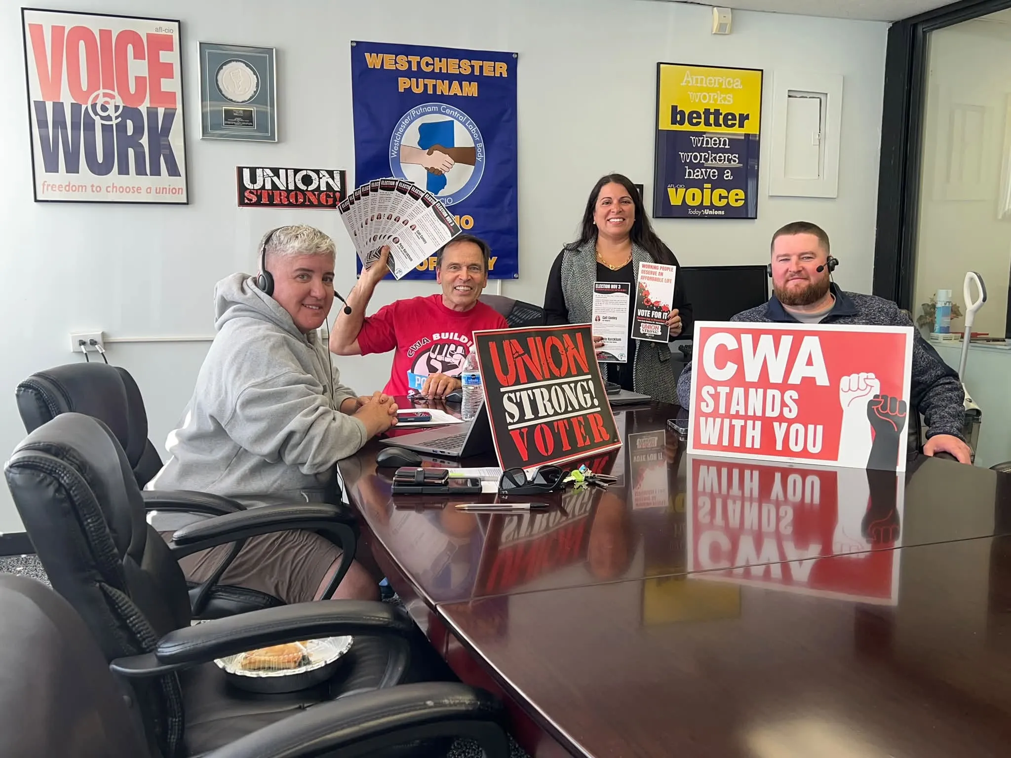 volunteers posing for photo at a phone bank