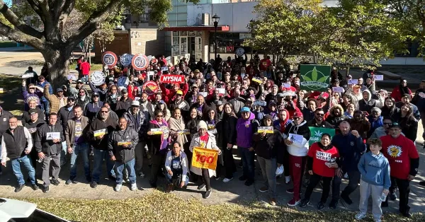 large group of volunteer union members/supporter posing for photo at labor walk